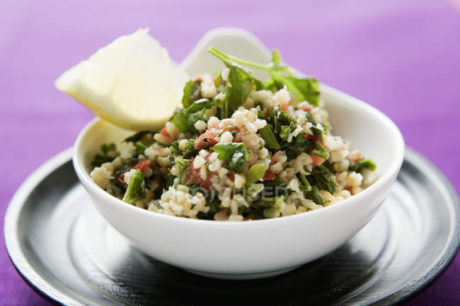 Pearl barley and parsley salad in a bowl — Stock Photo