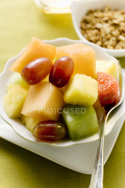Colourful fruit salad with berries — Stock Photo