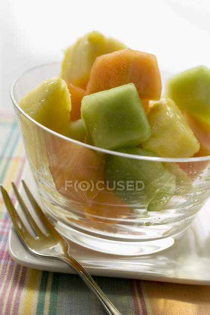 Pineapple and melon fruit salad — Stock Photo