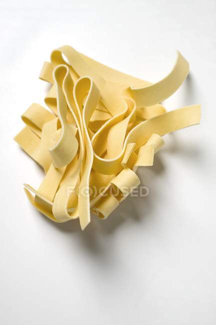 Dried Pappardelle pasta — Stock Photo