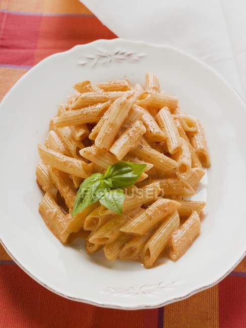 Penne pasta with tomato cream sauce — Stock Photo