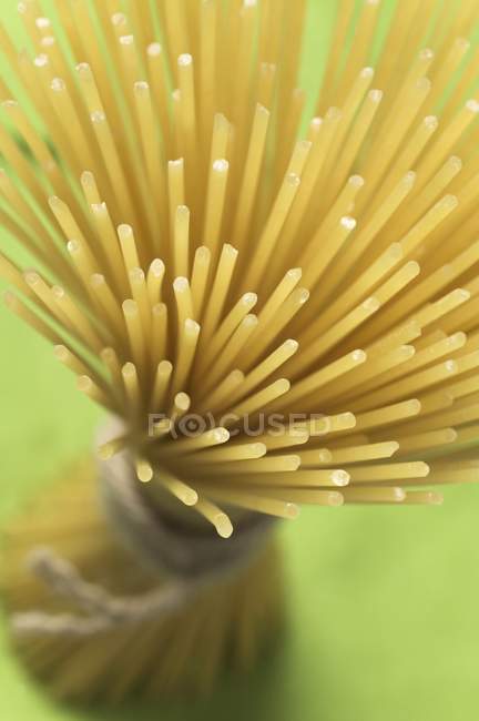 Raw dried spaghetti — Stock Photo