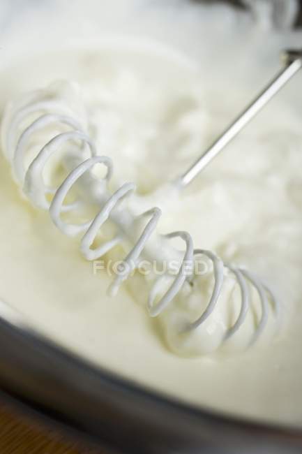 Closeup view of quark cream with whisk — Stock Photo