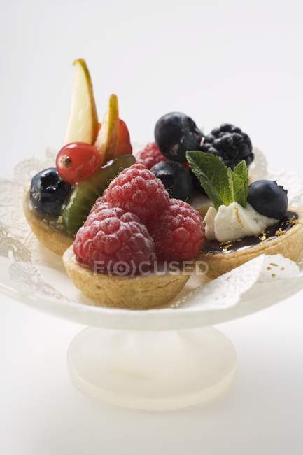 Fruit and berry tarts — Stock Photo