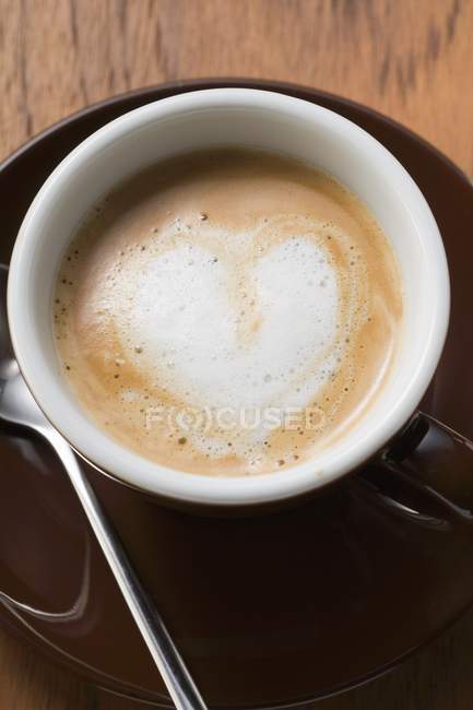 Taza de Espresso con espuma de leche — Stock Photo