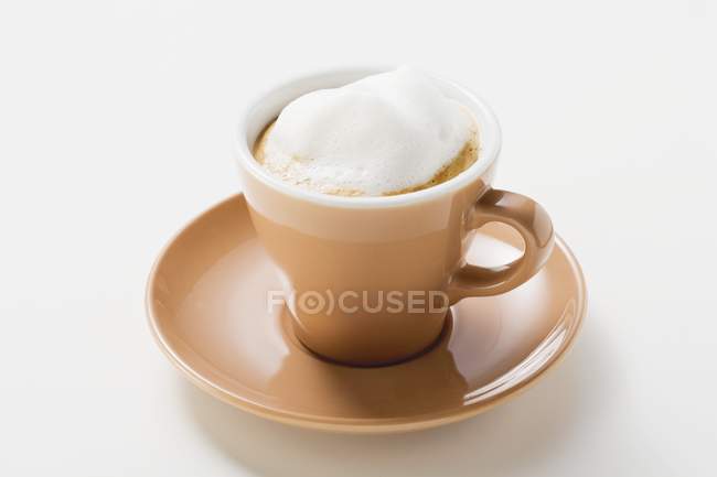 Cup of espresso with milk froth — Stock Photo