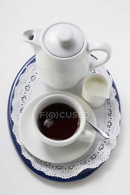 Black coffee in white cup — Stock Photo