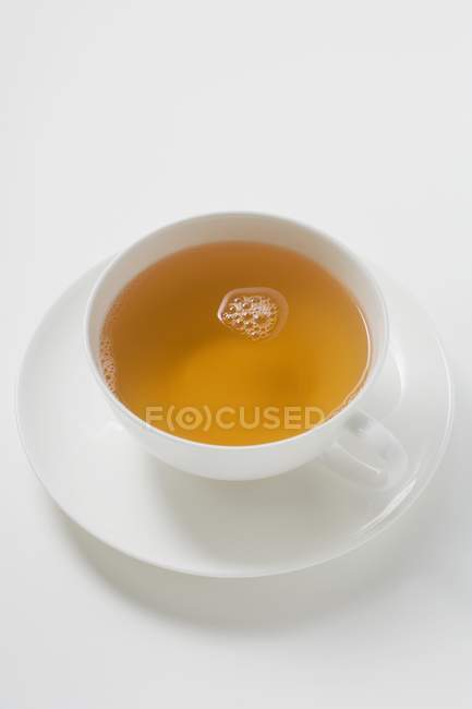 Chá em xícara branca — Fotografia de Stock