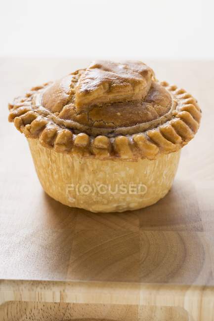 Meat pie on wooden — Stock Photo