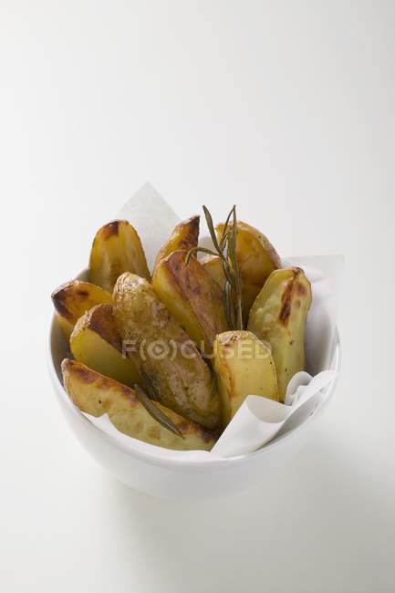 Baked potatoes with rosemary — Stock Photo