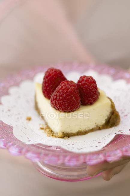 Mini-cheesecake with raspberries — Stock Photo