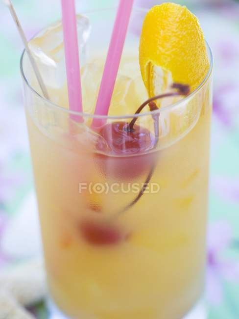 Fruit cocktail with cherries — Stock Photo