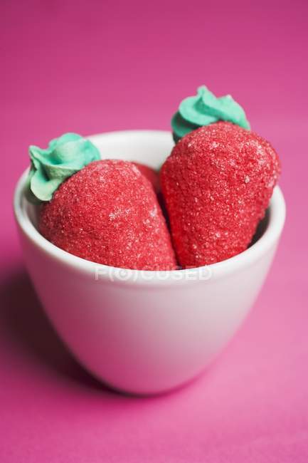 Sugar strawberries in white bowl — Stock Photo