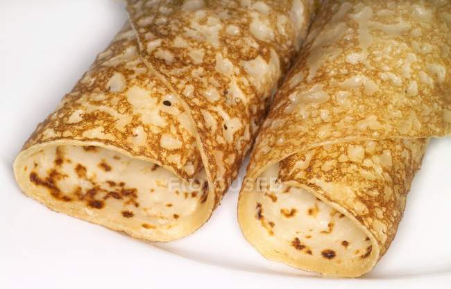 Two rolled-up pancakes — Stock Photo