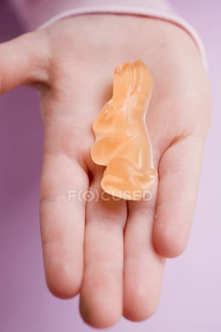 Hand holding jelly — Stock Photo
