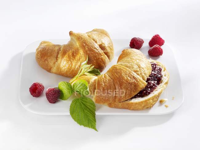 Croissants, plain and jam — Stock Photo