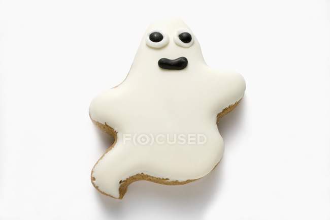 Ghost biscuit with white icing — Stock Photo