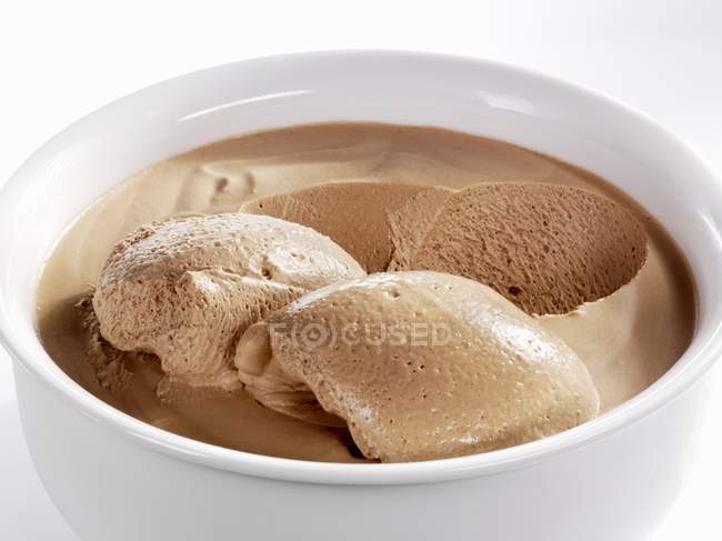 Chocolate mousse in white bowl — Stock Photo