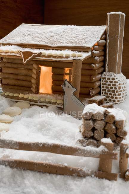 Gingerbread house with animal — Stock Photo