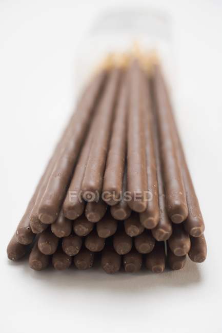 Bâtonnets de chocolat en tas — Photo de stock