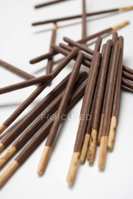 Chocolate sticks in heap — Stock Photo