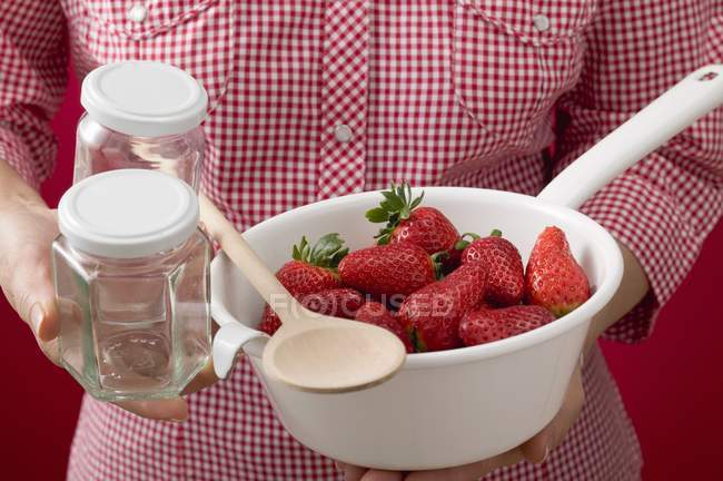 Woman holding strainer — Stock Photo