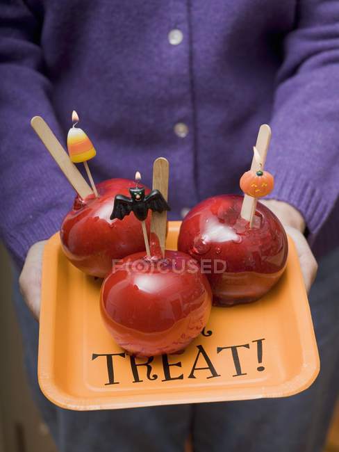 Tray of toffee apples for Halloween — Stock Photo