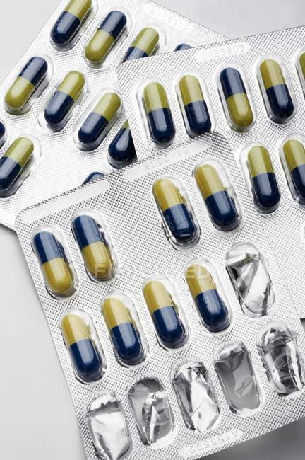Closeup view of packagings with colored capsules — Stock Photo