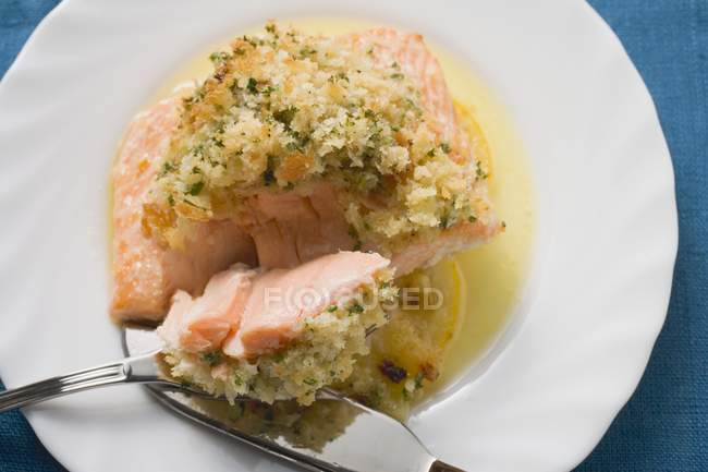 Salmon fillet with gratin topping — Stock Photo