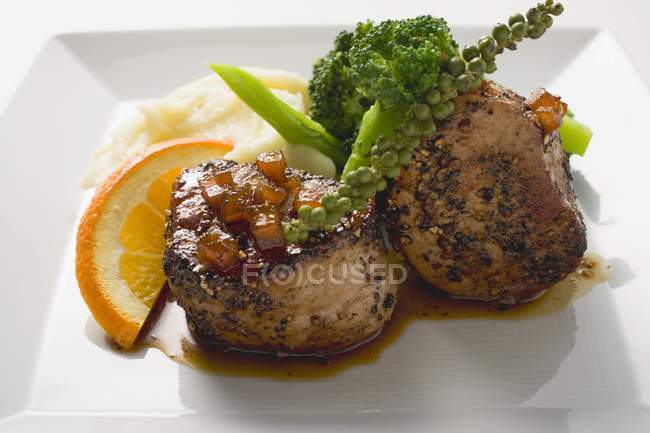 Pork medallions and mashed potatoes — Stock Photo
