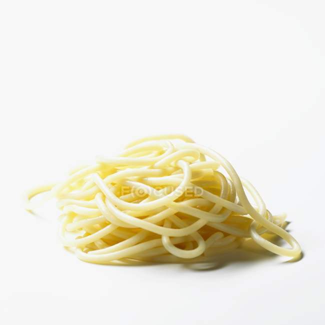 Bunch of cooked spaghetti pasta with oregano — Stock Photo