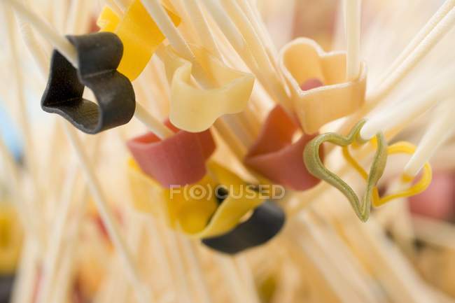 Dried colorful heart-shaped pasta — Stock Photo