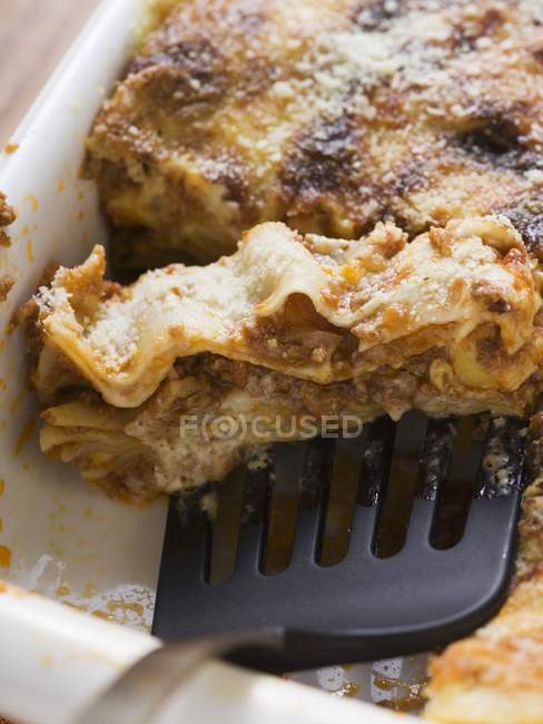 Baked lasagne in baking dish — Stock Photo