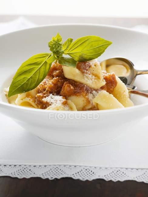 Tortellini pasta with mince sauce and Parmesan — Stock Photo