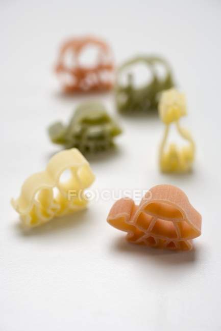 Coloured animal-shaped pasta — Stock Photo