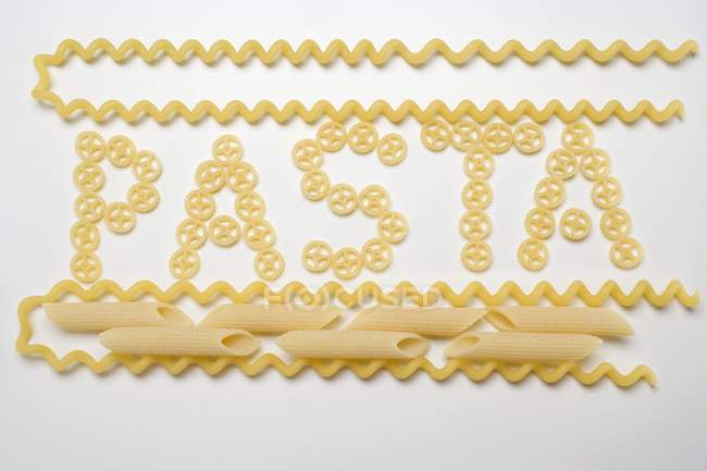 Parola Pasta di pezzi di pasta ruota — Foto stock