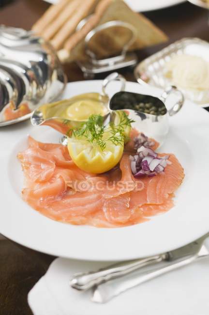 Smoked salmon on plate — Stock Photo