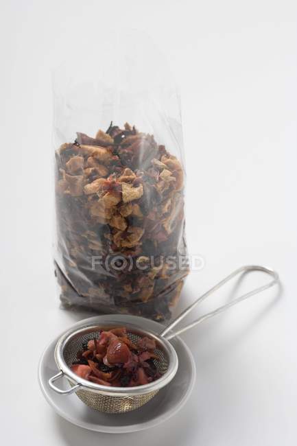 Fruit tea in cellophane — Stock Photo