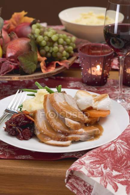 Elevated view of turkey breast with accompaniments for Thanksgiving — Stock Photo