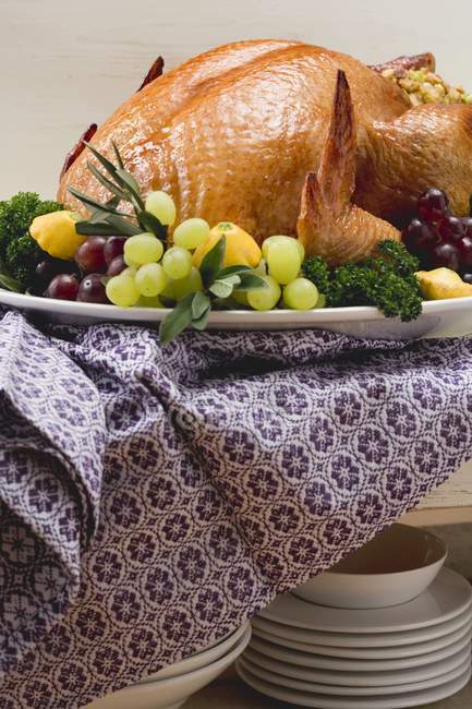 Stuffed turkey with herbs and grapes — Stock Photo
