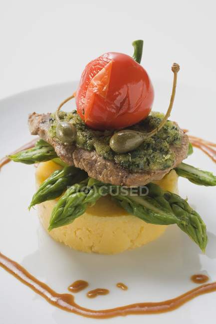 Escalope with herbs on plate — Stock Photo