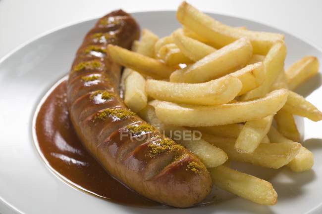 Currywurst con patatine fritte — Foto stock