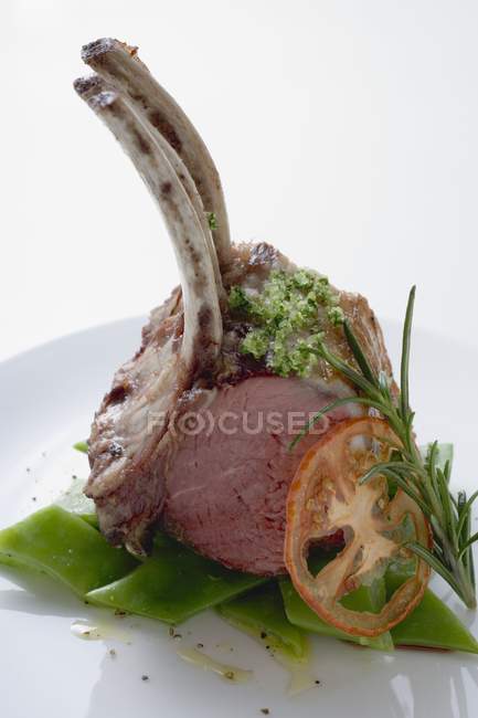 Roasted rack of lamb with herb crust — Stock Photo