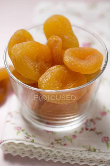 Dried apricots in glass — Stock Photo