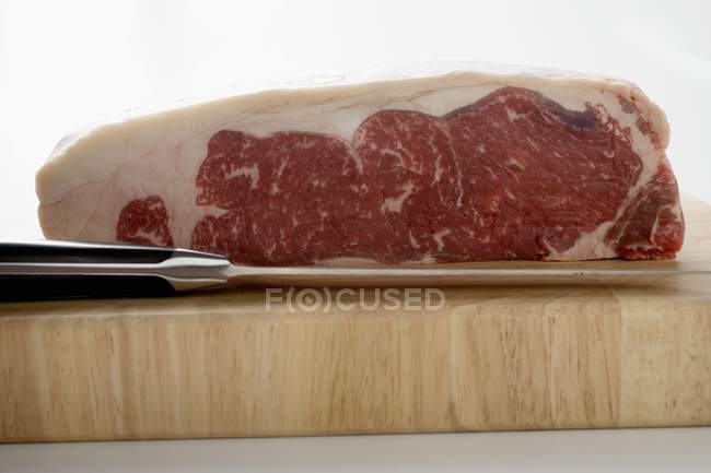 Piece of raw beef sirloin — Stock Photo