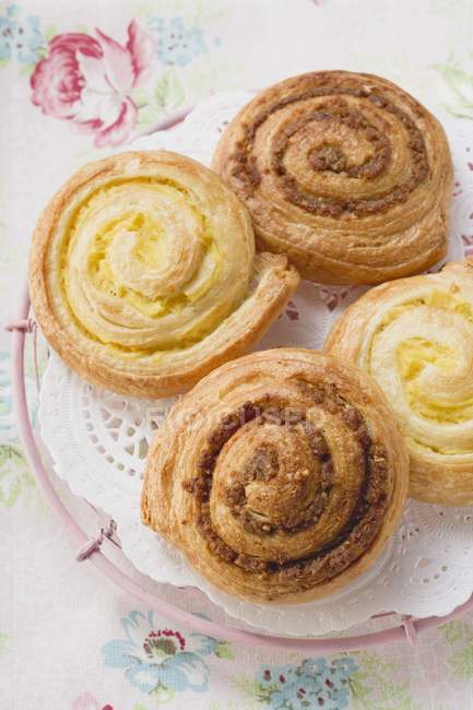 Danish pastry snails with nut and custard — Stock Photo
