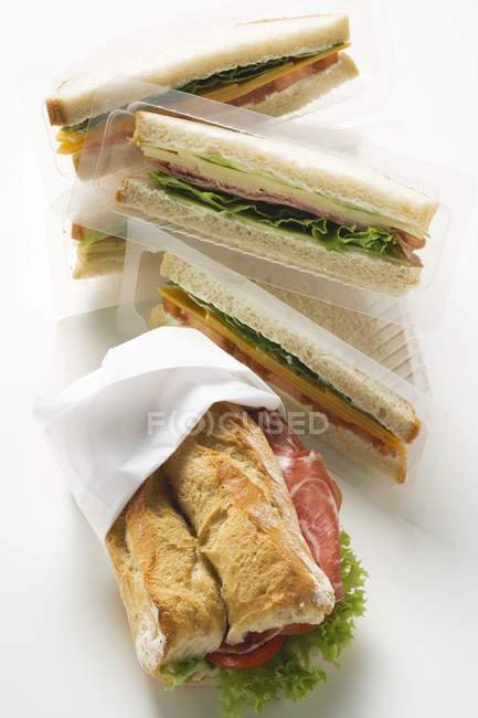 Ham sandwiches with lettuce — Stock Photo