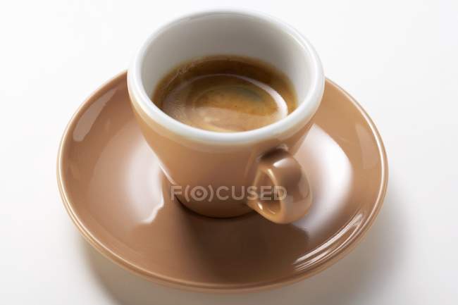 Brown cup of hot espresso — Stock Photo