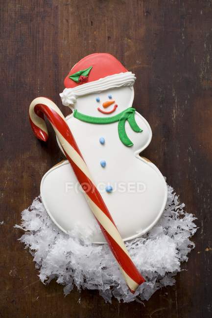 Snowman biscuit and candy — Stock Photo