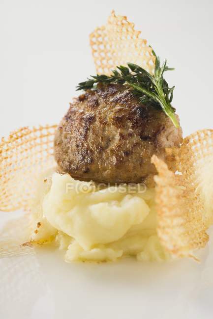 Meatball on mashed potatoes — Stock Photo